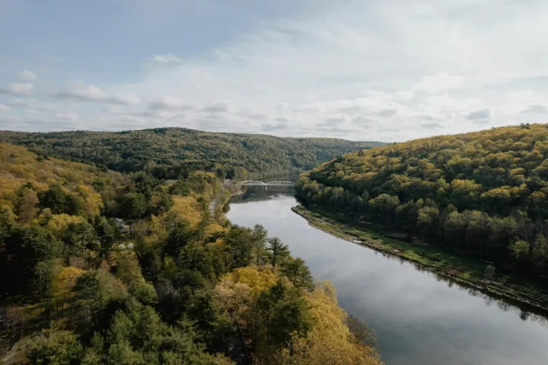 The Delaware River at Pond Eddy, New York, framed by autumn hills